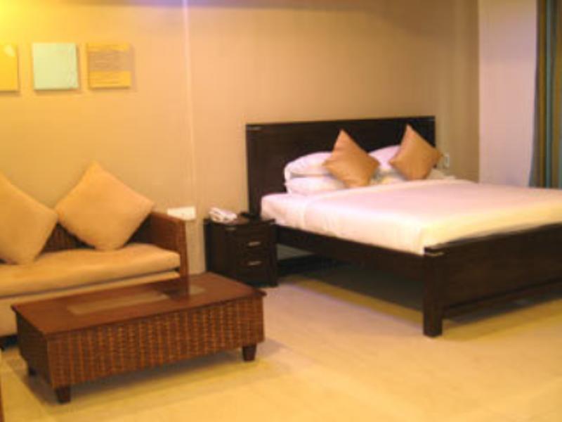 Hotel The Elite Suites Pune Room photo