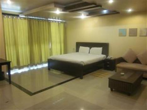 Hotel The Elite Suites Pune Room photo